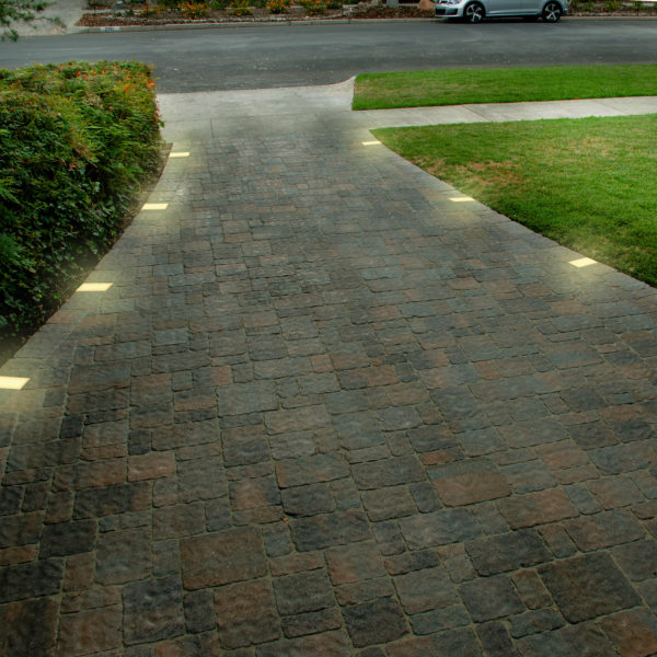 Outdoor Pathway Illuminated by Lumengy 6x6 Paver Lights