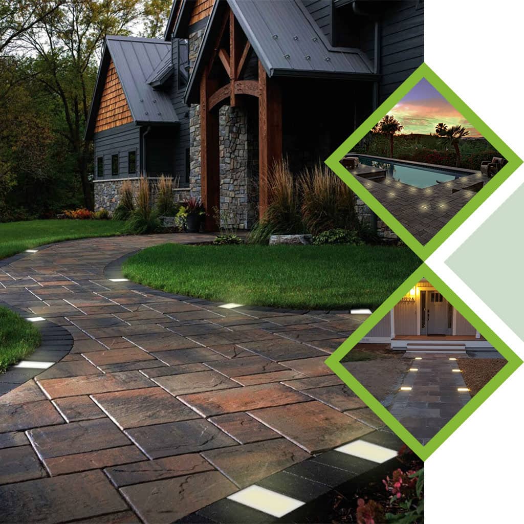 A photo of paver lights highlighting a wall and planters in an outdoor space.