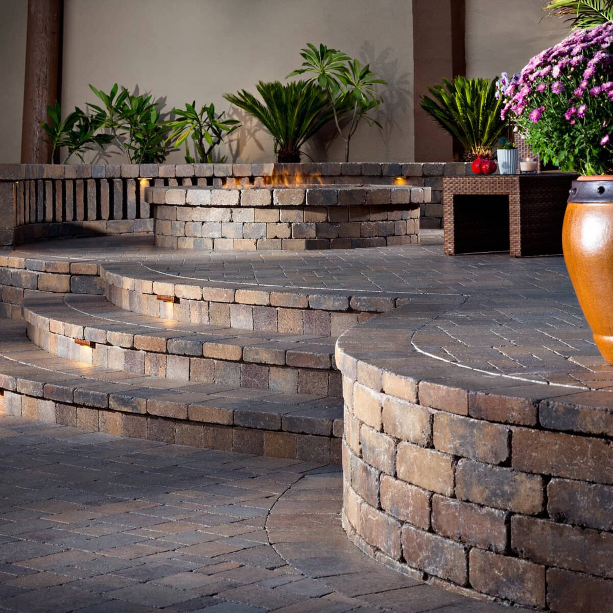 Stonewall and steps with hardscape lighting on the edges